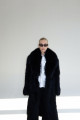 Long women's black fox fur coat