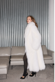 Long women's white fox fur coat