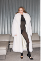 Long women's white fox fur coat