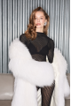 Long women's white fox fur coat