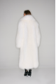 Long women's white fox fur coat