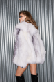 White raccoon fur coat with gray trim and hood