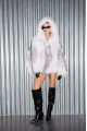 White raccoon fur coat with gray trim and hood