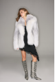 Stylish white fox fur coat with gray highlights