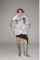 Women's fur coat made of white-headed black fox
