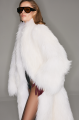 Long women's white fox fur coat
