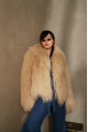 Women's beige sheepskin coat made of natural llama