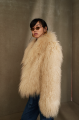 Women's beige sheepskin coat made of natural llama