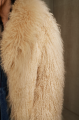 Women's beige sheepskin coat made of natural llama