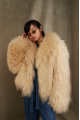 Women's beige sheepskin coat made of natural llama