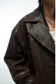 Stylish jacket made of natural leather in dark chocolate color