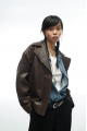 Stylish jacket made of natural leather in dark chocolate color