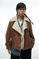 Women's vintage sheepskin coat made of brown natural sheepskin