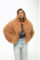 Caramel-colored women's sheepskin coat made of natural llama