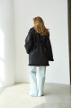 Women's sheepskin coat of black color made of natural sheepskin in VINTAGE style