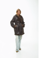 Women's sheepskin coat of dark chocolate color made of natural sheepskin in VINTAGE style