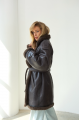 Women's sheepskin coat of dark chocolate color made of natural sheepskin in VINTAGE style