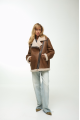 Women's sheepskin coat of light brown color made of natural sheepskin in VINTAGE style