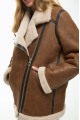 Women's sheepskin coat of light brown color made of natural sheepskin in VINTAGE style