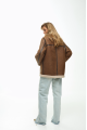 Women's sheepskin coat of light brown color made of natural sheepskin in VINTAGE style