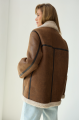 Women's sheepskin coat of light brown color made of natural sheepskin in VINTAGE style