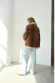 Women's sheepskin coat of light brown color made of natural sheepskin in VINTAGE style