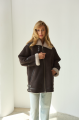 A chocolate-colored sheepskin coat made of natural sheepskin in the VINTAGE style