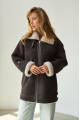 A chocolate-colored sheepskin coat made of natural sheepskin in the VINTAGE style