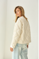 Demi-season jacket of beige color