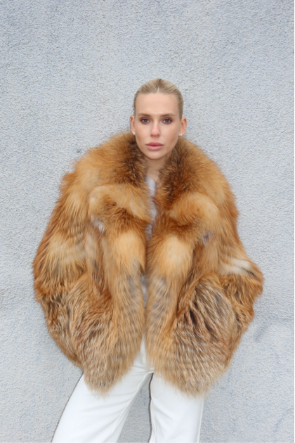 Stylish women's red fox fur coat