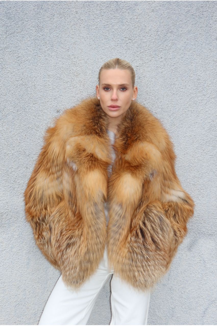 Stylish women's red fox fur coat