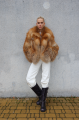 Stylish women's red fox fur coat