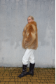 Stylish women's red fox fur coat