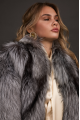 Stylish gray fur coat made of black fox