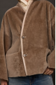 Women's double-sided beige sheepskin coat made of merino sheep