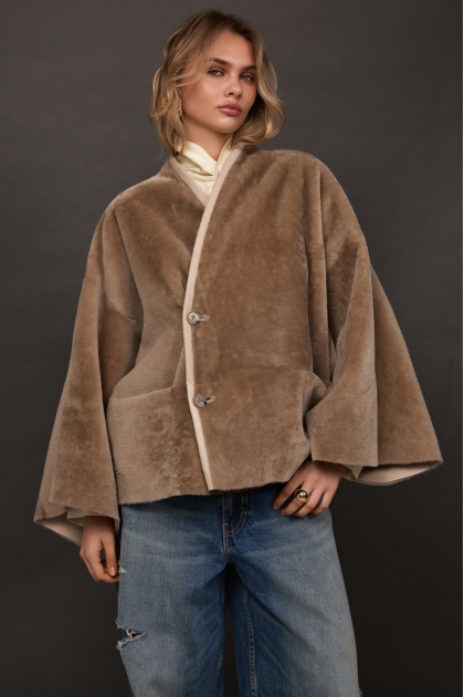 Women's double-sided beige sheepskin coat made of merino sheep