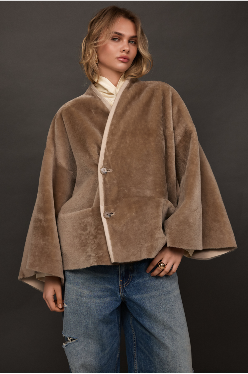 Women's double-sided beige sheepskin coat made of merino sheep