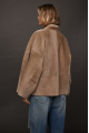 Women's double-sided beige sheepskin coat made of merino sheep