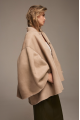Loose-fitting beige suede sheepskin coat