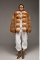 Stylish women's red fox fur coat