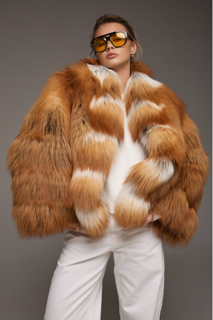 Stylish women's red fox fur coat