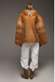 Stylish women's red fox fur coat
