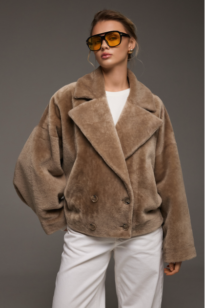 Reversible short sheepskin bomber jacket in beige