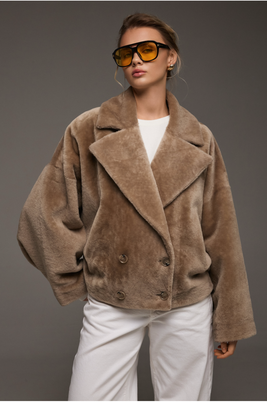 Reversible short sheepskin bomber jacket in beige