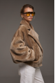 Reversible short sheepskin bomber jacket in beige