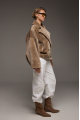 Reversible short sheepskin bomber jacket in beige