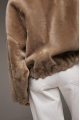 Reversible short sheepskin bomber jacket in beige