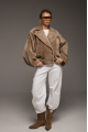 Reversible short sheepskin bomber jacket in beige