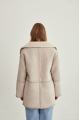 Women's sheepskin coat of beige color made of natural sheepskin