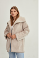 Women's sheepskin coat of beige color made of natural sheepskin